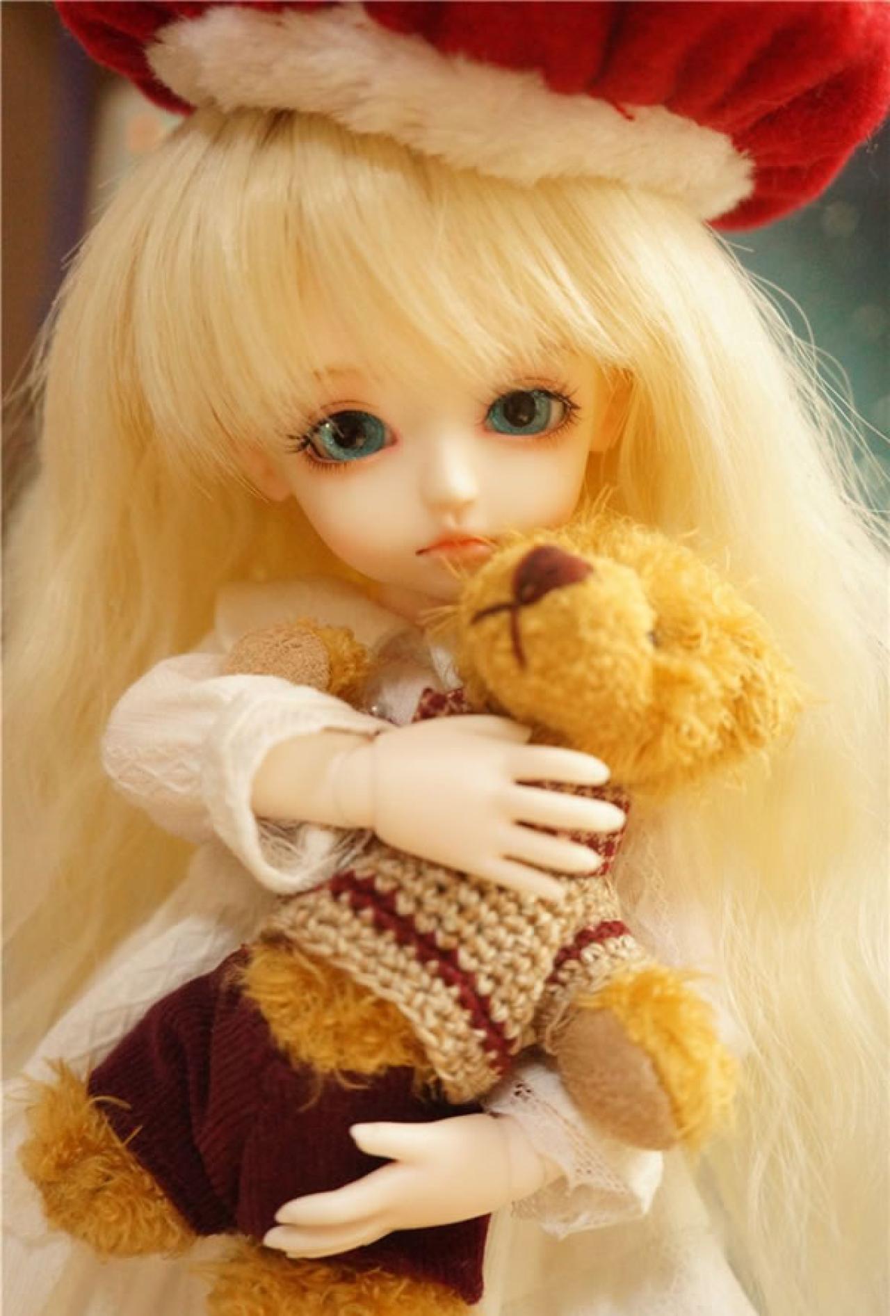 魚不喜的SD娃娃喜儿戴着圣诞帽抱着泰迪小熊的可爱模样