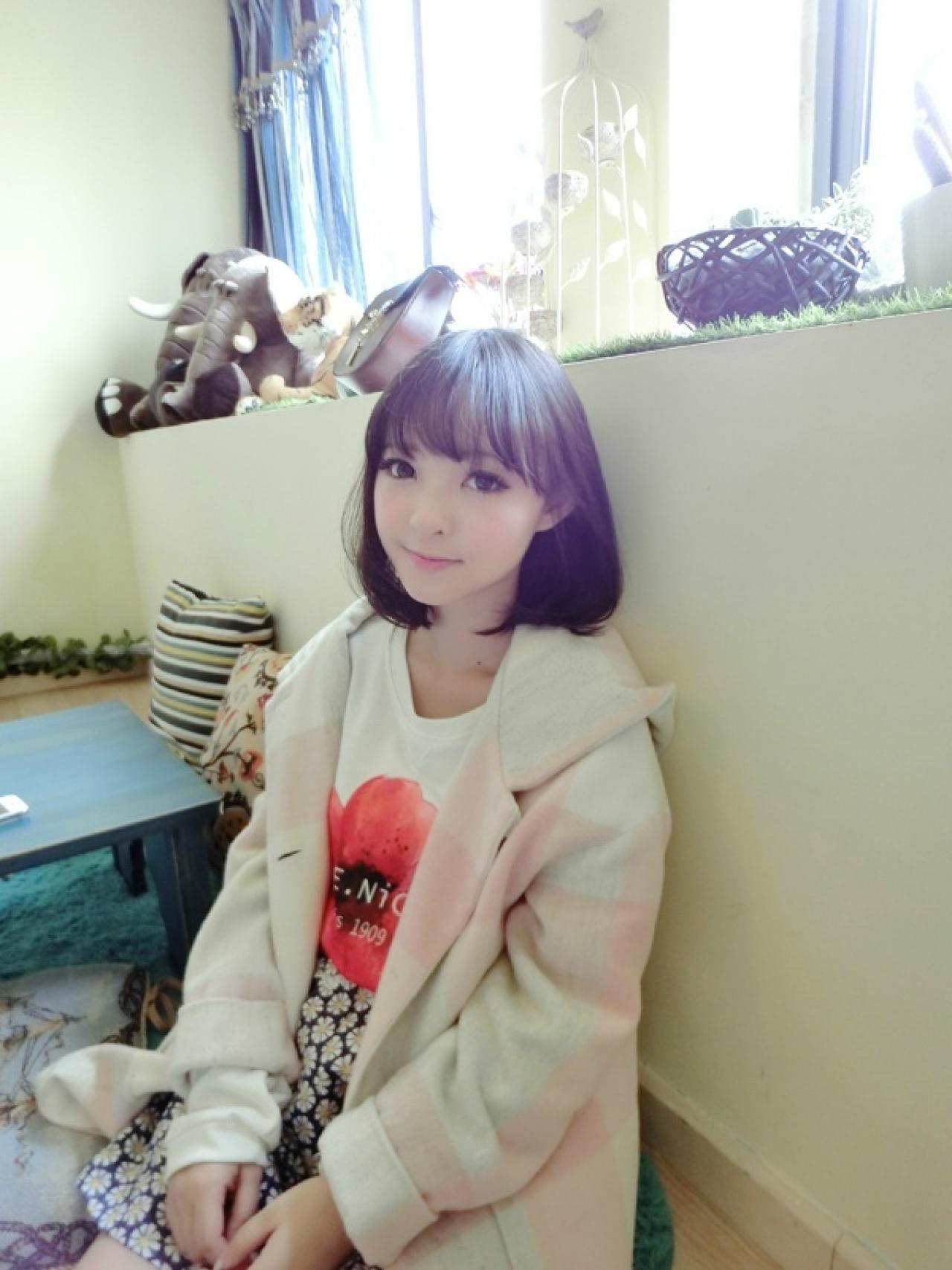 十四娘半靠在墙上