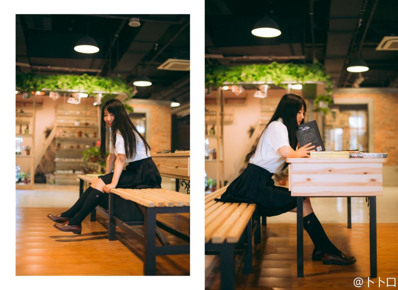 暴娇班长小陆离坐在长椅上，下巴抵着书