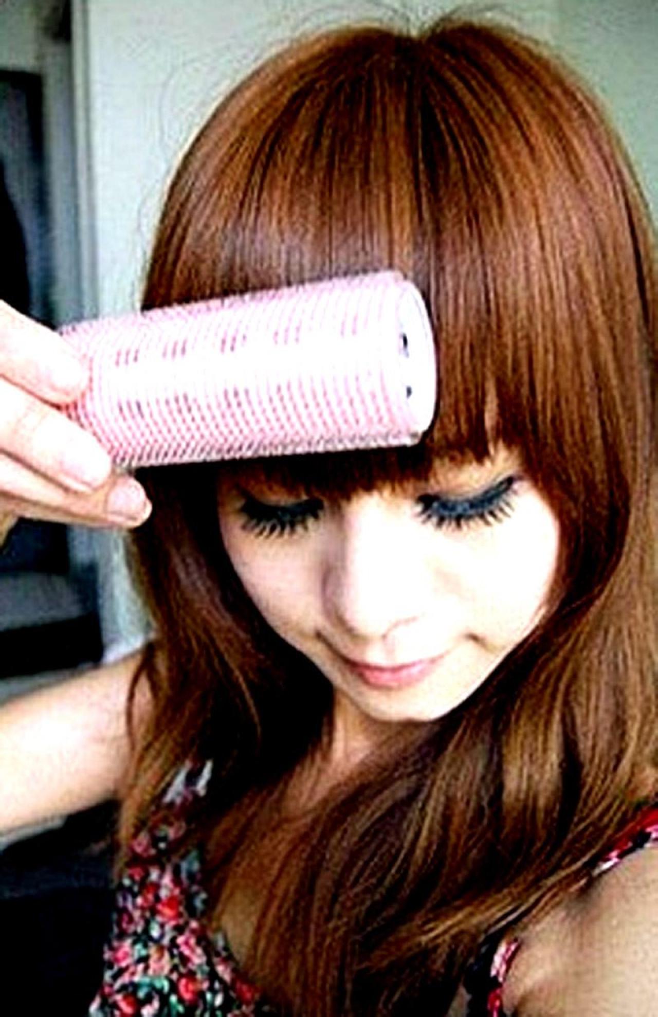 周游世界的青虫正在卷自己齐齐的刘海儿