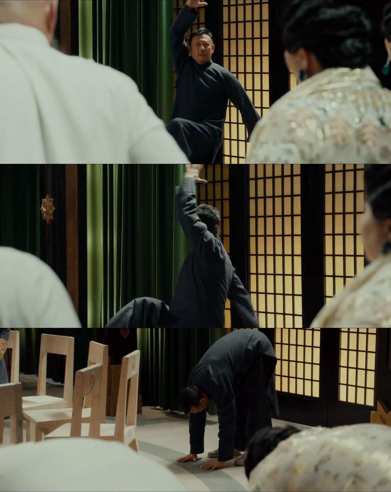 电影《一步之遥》剧照：姜文饰演的马走日在武大帅面前，示范快速双手摸地的方法，动作图解