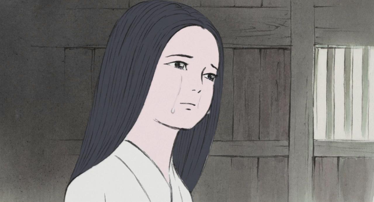 小女孩的脸颊上流淌着两行眼泪