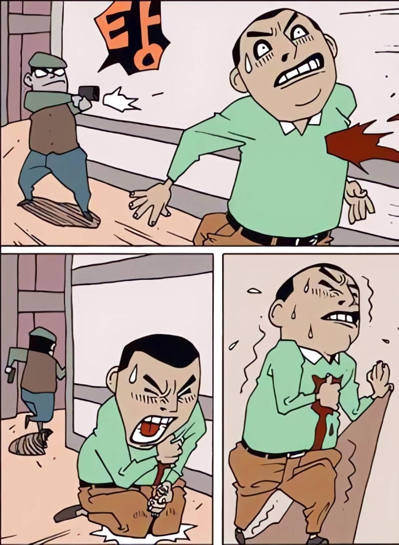 走在路上的男人，被身后的歹徒从开枪击中后背